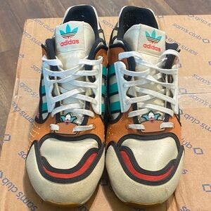 Adidas Cream and Brown Sneakers with Teal Stripes